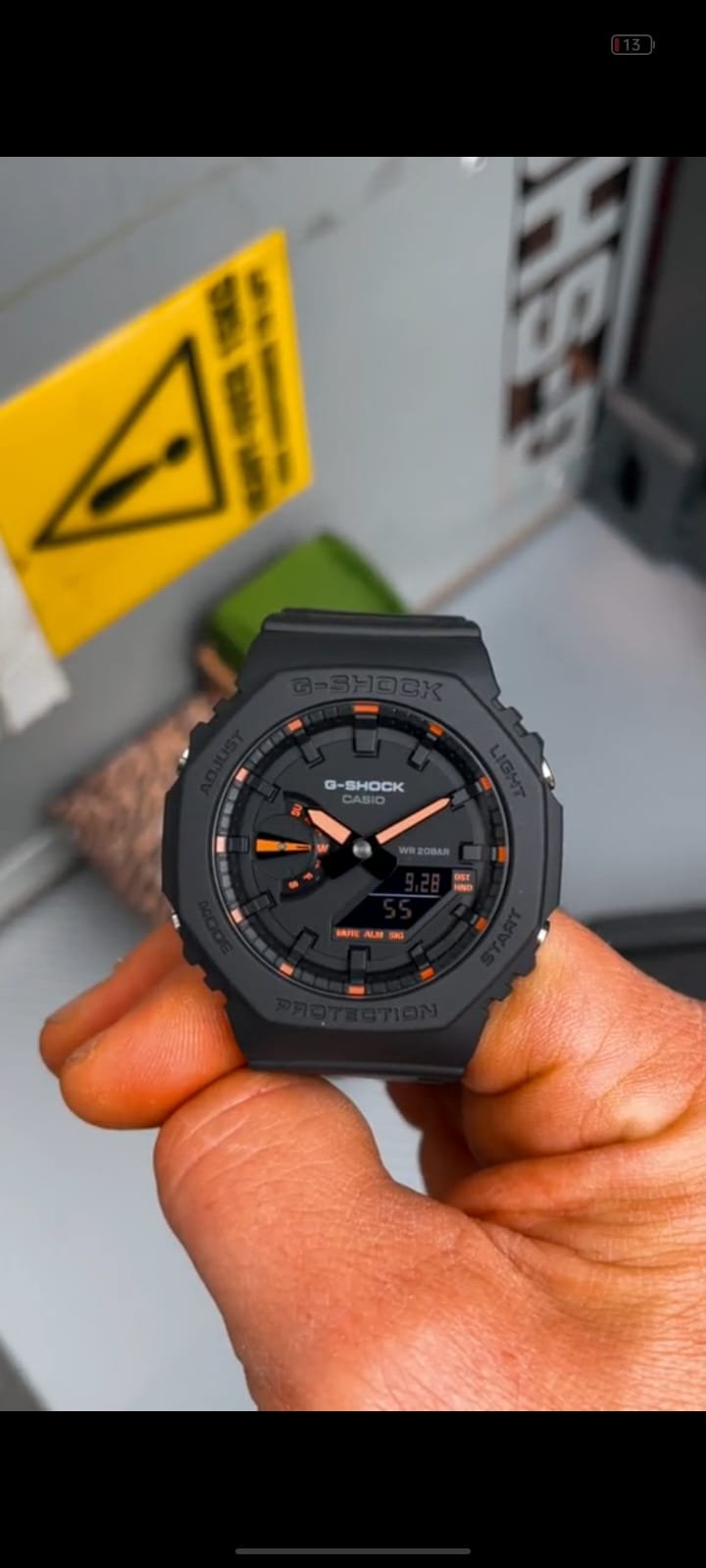 Black with orange needles